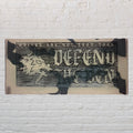 DEFEND THE DEN PLAQUE image 0